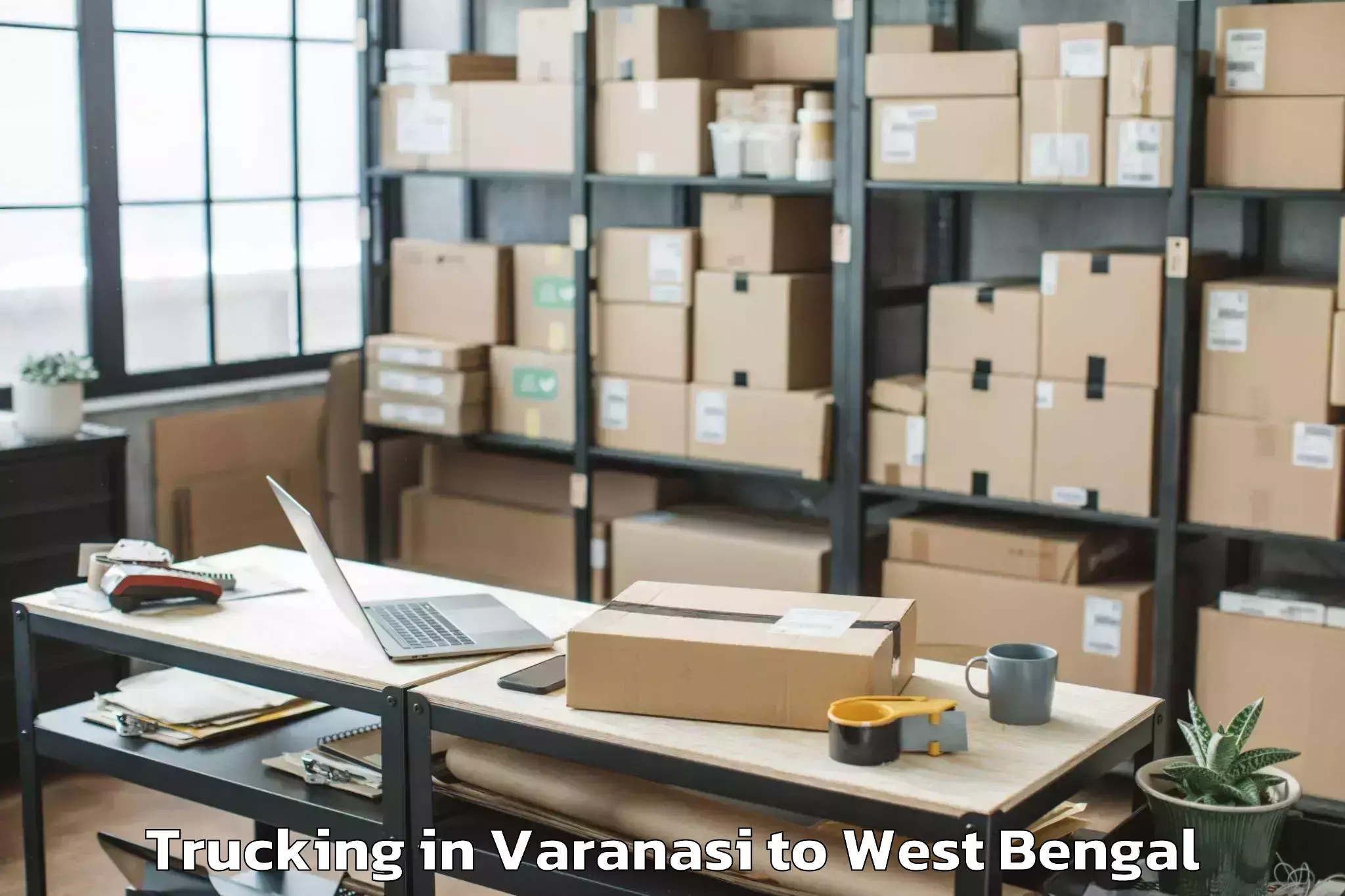 Top Varanasi to Haringhata Trucking Available